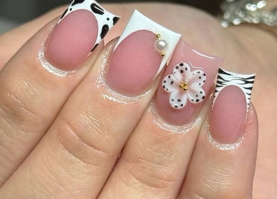 Elegant nail art with floral design at House of Pedi’s by Lydia in Tucson, Arizona, US.