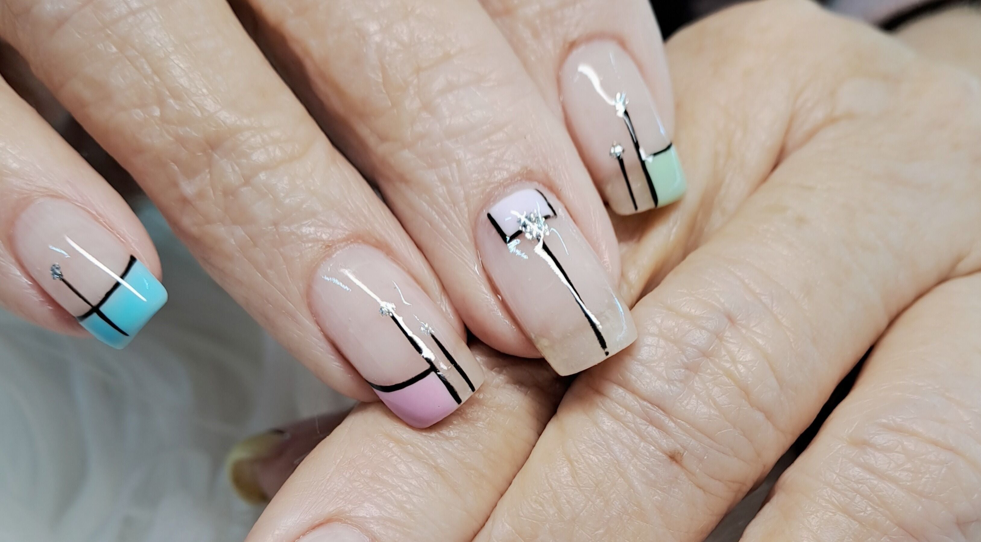 Colorful geometric nail art at Beatrice Go Girl Nails in Boksburg, Gauteng, ZA showcasing modern designs.