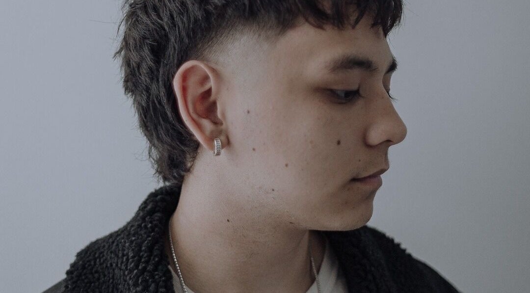 Modern sidecut hairstyle at Barber Stylist Ben, Windsor, Ontario, CA.