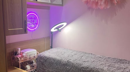 Heather Kelly Beauty cozy treatment room with neon light in Dublin 13, County Dublin, IE.