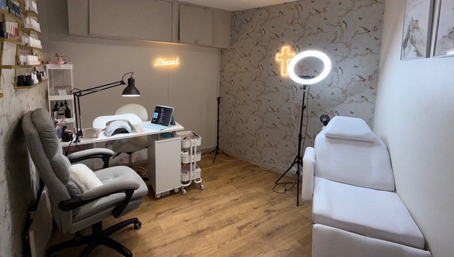 Mai Nails and Lash Studio in London, England, GB. Inviting seating with nail and lash equipment.