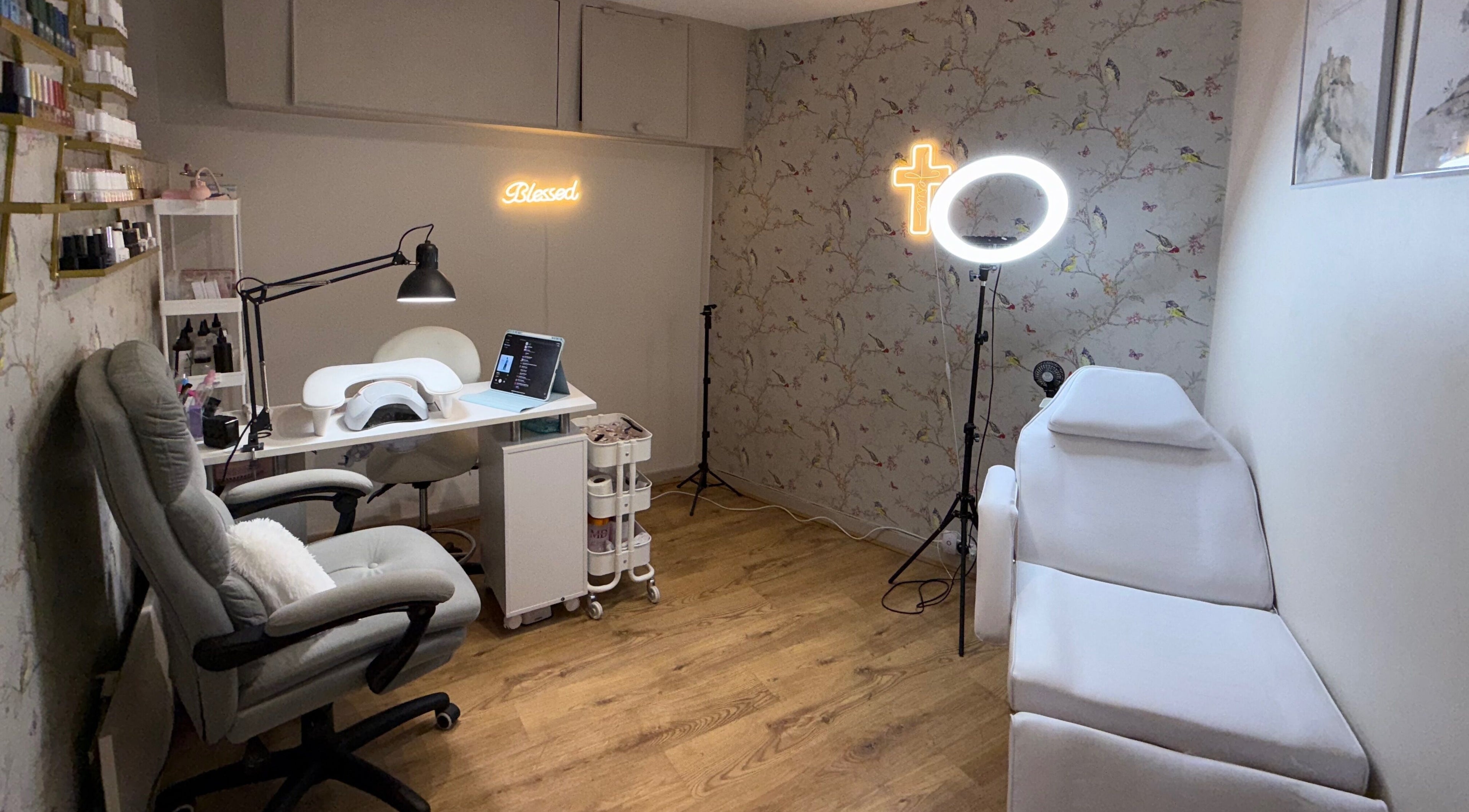 Mai Nails and Lash Studio in London, England, GB. Inviting seating with nail and lash equipment.