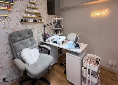Cozy nail station at Mai Nails and Lash Studio in London, England, GB with elegant decor and vibrant products.
