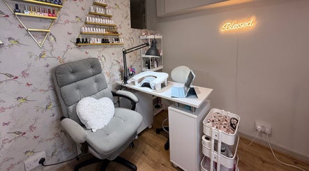 Cozy nail station at Mai Nails and Lash Studio in London, England, GB with elegant decor and vibrant products.