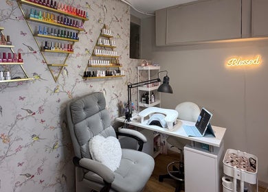 Cozy interior of Mai Nails and Lash Studio in London, England, GB, showcasing a stylish nail care setup.