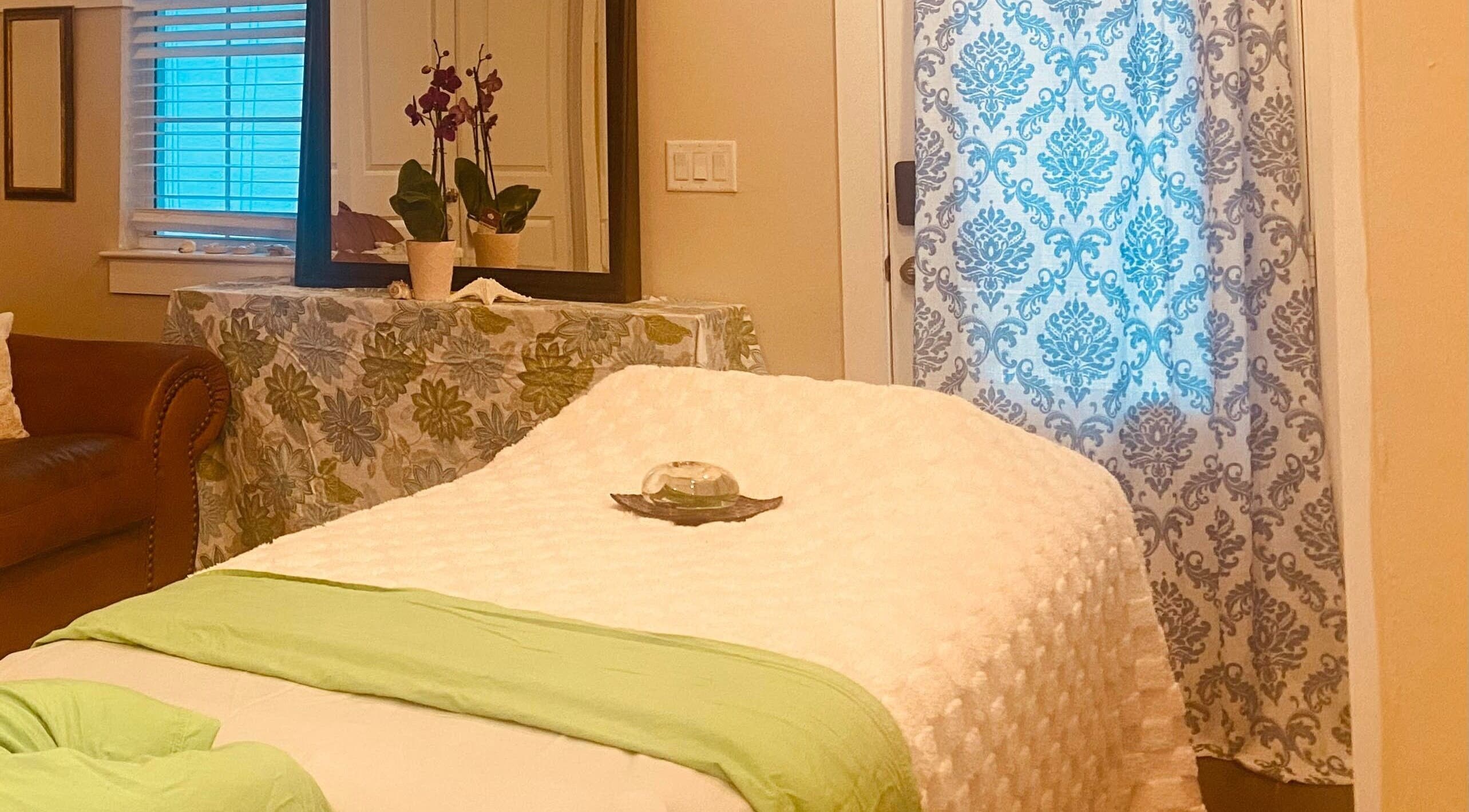 Cozy therapy room at Lexay Wellness llc in Naples, Florida, US with a massage table and calming decor.