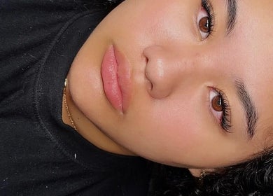 Close-up of a radiant face showcasing flawless skin at Skulptured Skin & Body, Ropes Crossing, New South Wales, AU.