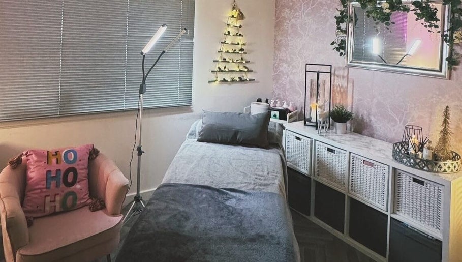 Cozy treatment room at Beauty With Katie in Dunfermline, Scotland, GB with modern decor and soft lighting.