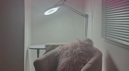 Comfortable seating with a plush chair at Beauty With Katie, Dunfermline, Scotland, GB.