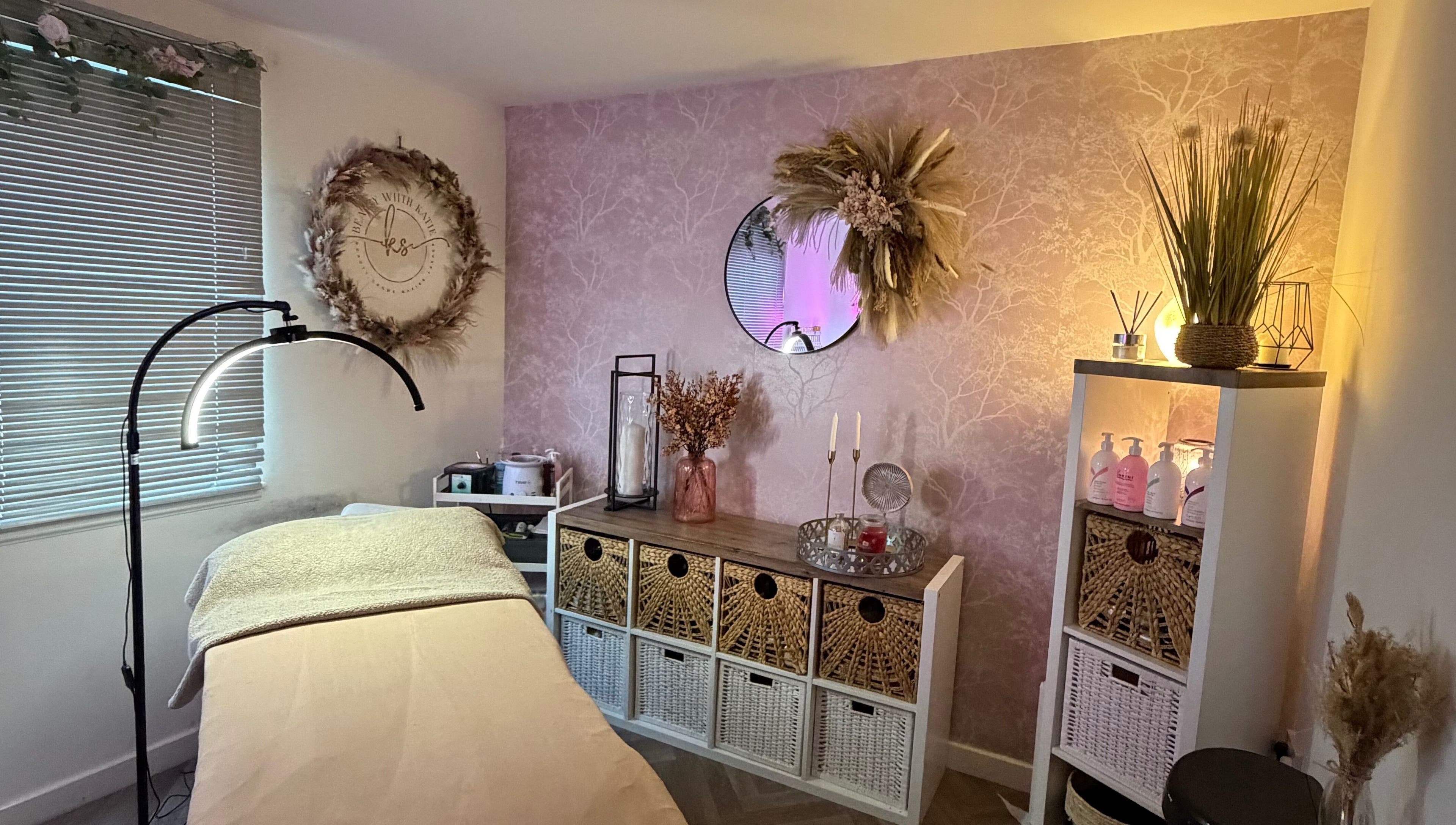 Cozy treatment room at Beauty with Katie, Rosyth, Scotland, GB with soft lighting and elegant decor.