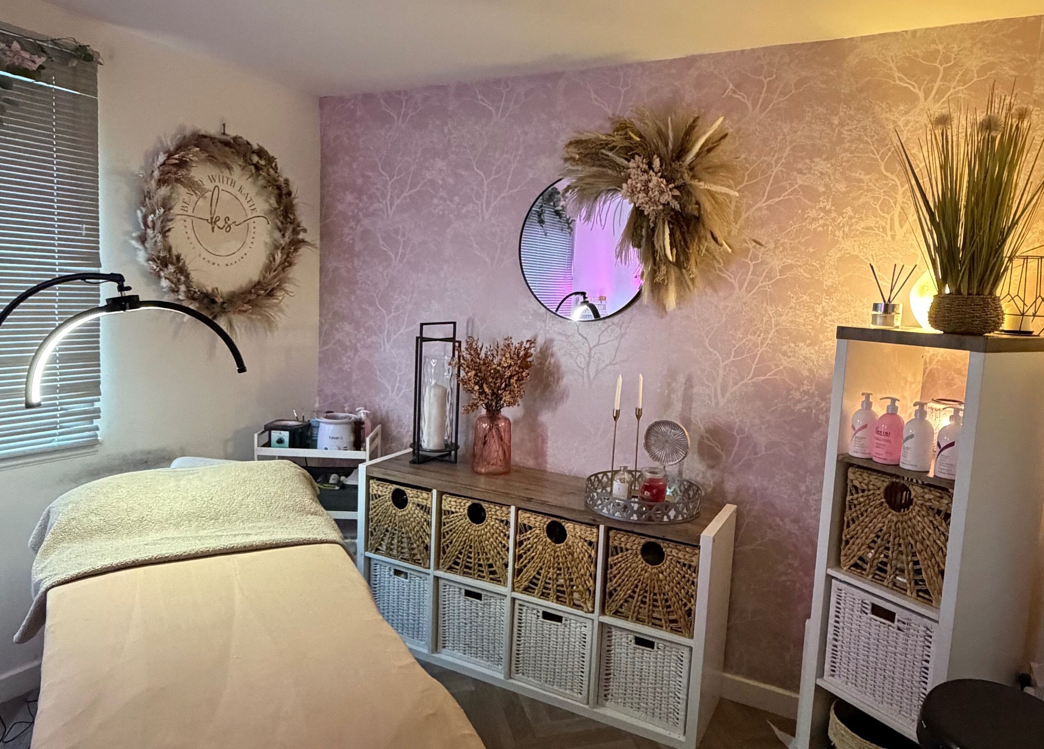 Cozy treatment room at Beauty with Katie, Rosyth, Scotland, GB with soft lighting and elegant decor.