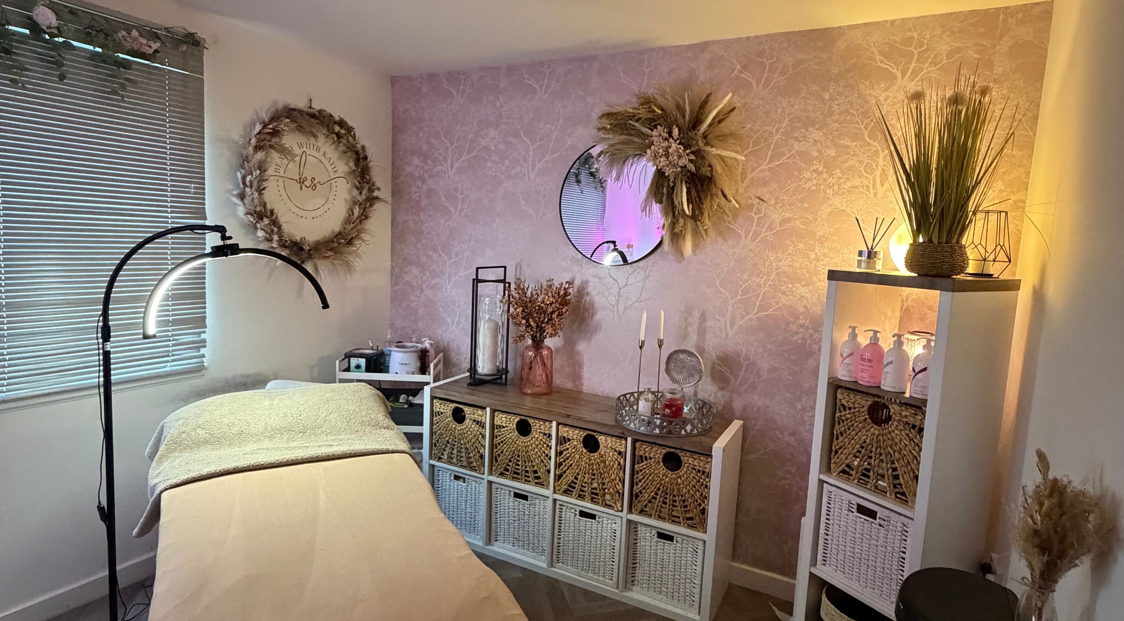 Cozy treatment room at Beauty with Katie, Rosyth, Scotland, GB with soft lighting and elegant decor.