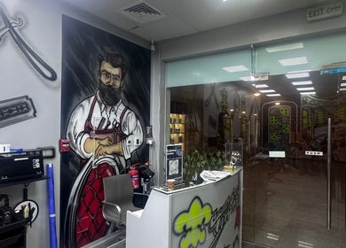 Stylish interior at Glowing Gents Salon and Spa, Dubai, Dubai, AE, featuring urban wall art and modern decor.