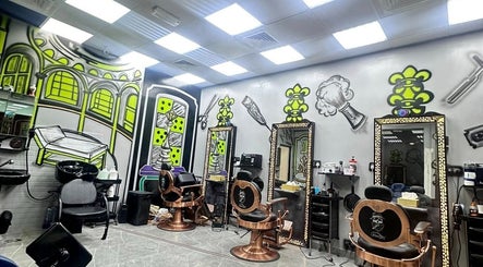 Vibrant interior of Glowing Gents Salon and Spa, Dubai, Dubai, AE with artistic wall designs and modern chairs.