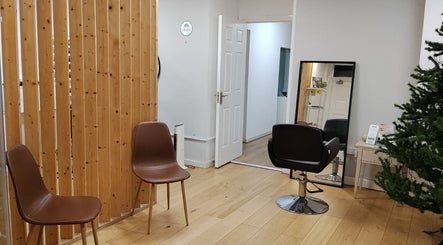 Chic salon interior at Shey Waxing & Beauty, Dublin, County Dublin, IE. Modern seating with stylish decor.