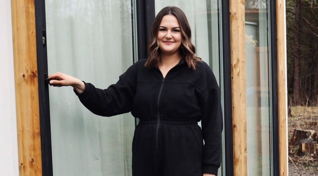 Host greeting at Smile and Glo in Oxford Station, Ontario, CA, showcasing the venue's inviting entrance.