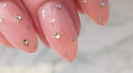 Elegant glittering nail art at Tetyana's Beauty in Colchester, England, GB.