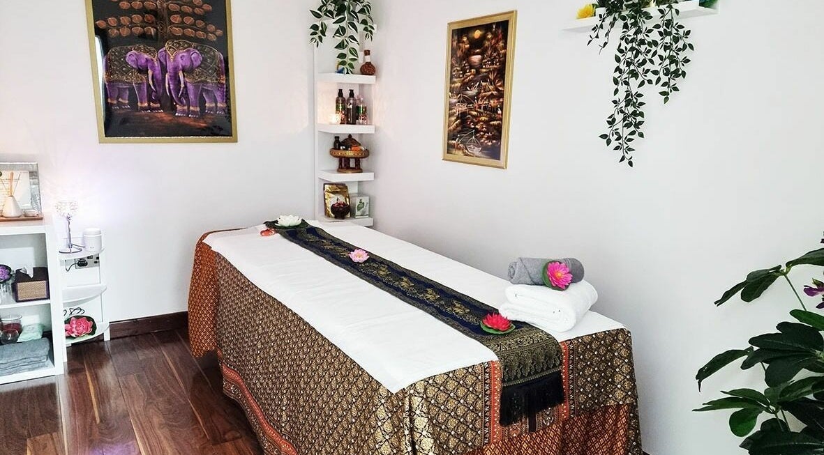 Massage room at Lanna Thai Massage and Wellness in Cheadle Hulme, England, GB, with tranquil decor.