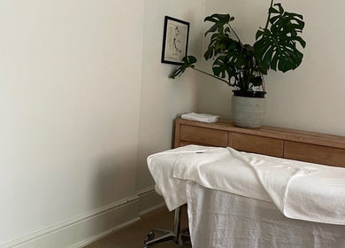 Relaxing treatment room at Restoree | Holistic Remedial Massage, Bondi, New South Wales, AU with a massage bed.