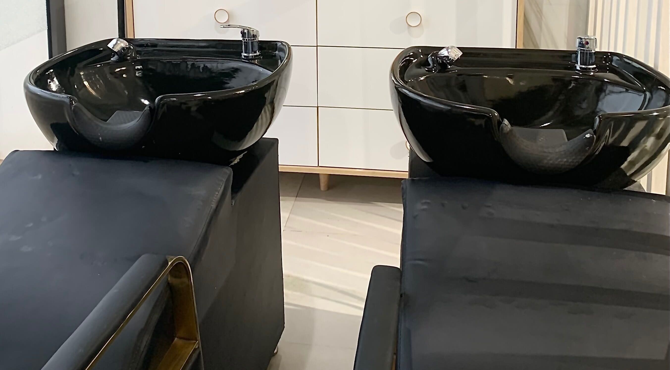 Elegant wash basin at Aurora Beauty Bay, Accra, Greater Accra Region, GH, offering premium hair care services.