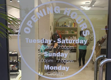 Opening hours of Aurora Beauty Bay in Accra, Greater Accra Region, GH with visible salon interior.