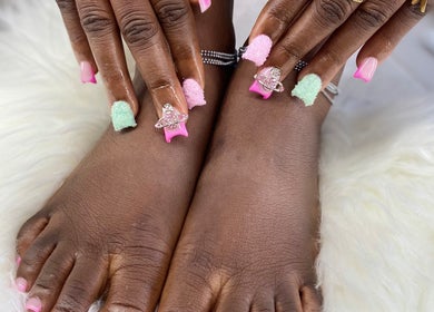 Stylish pastel nail art at Aurora Beauty Bay, Accra, Greater Accra Region, GH, showcasing hand and foot care.