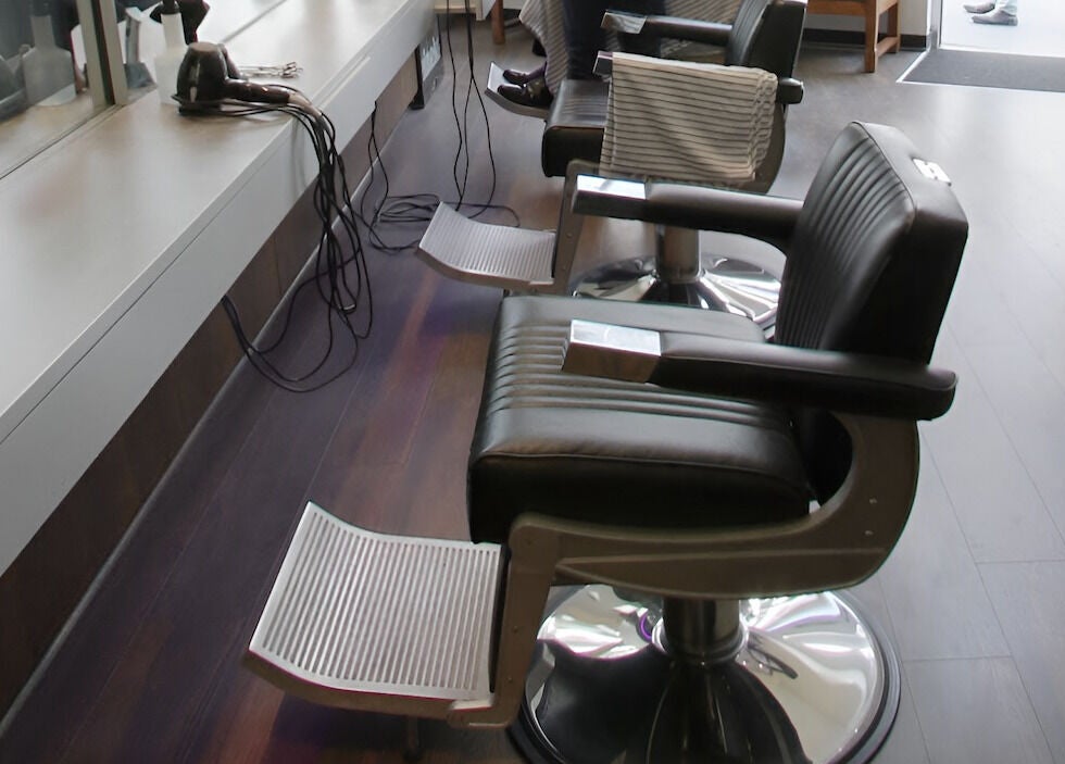 Sleek salon chairs inside The Gentry - Shortland Street, Auckland, Auckland, NZ.