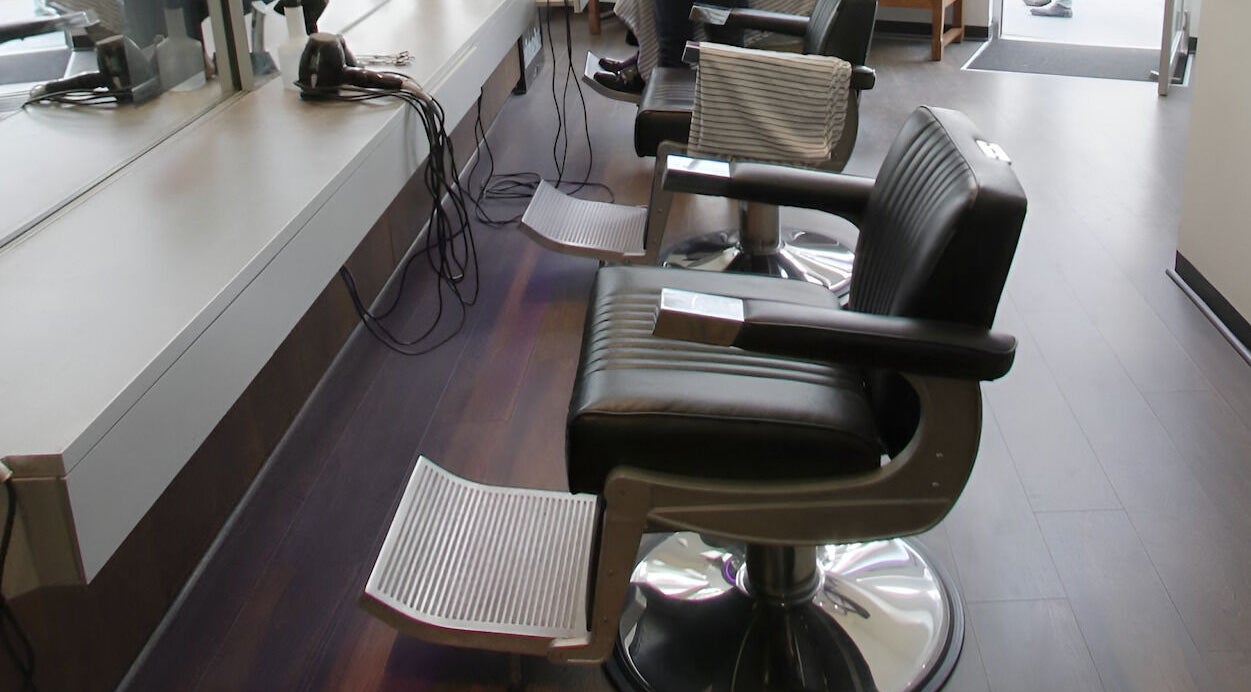 Sleek salon chairs inside The Gentry - Shortland Street, Auckland, Auckland, NZ.