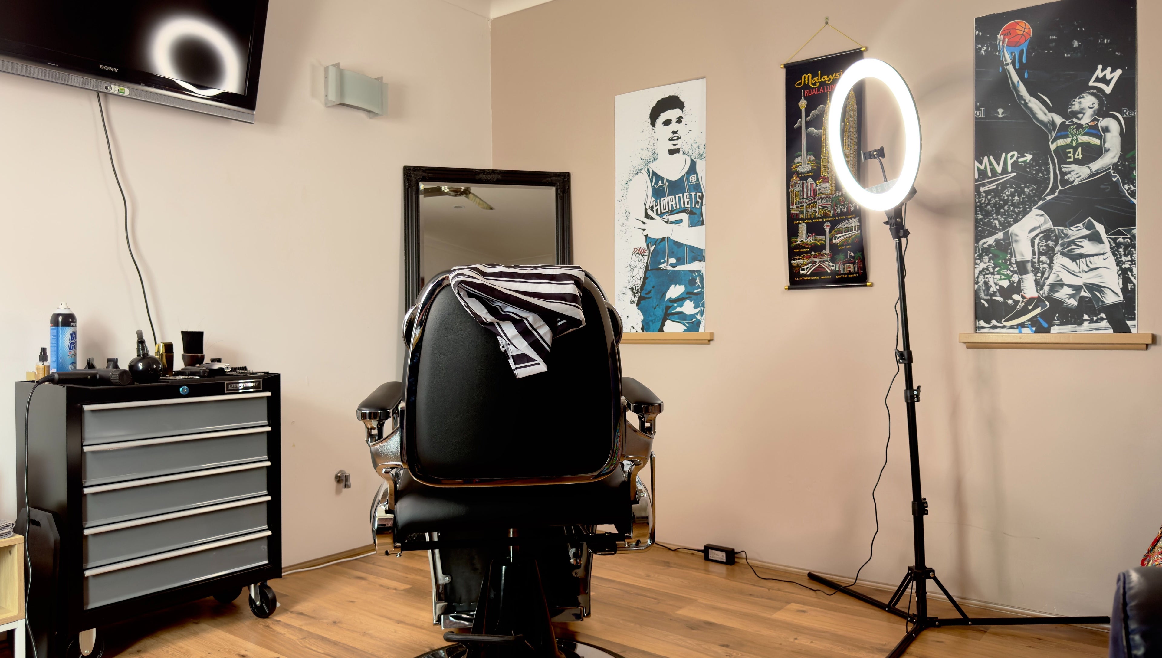 Modern barber chair at Scully’s Barbershop in Clarkson, Western Australia, AU with stylish decor.