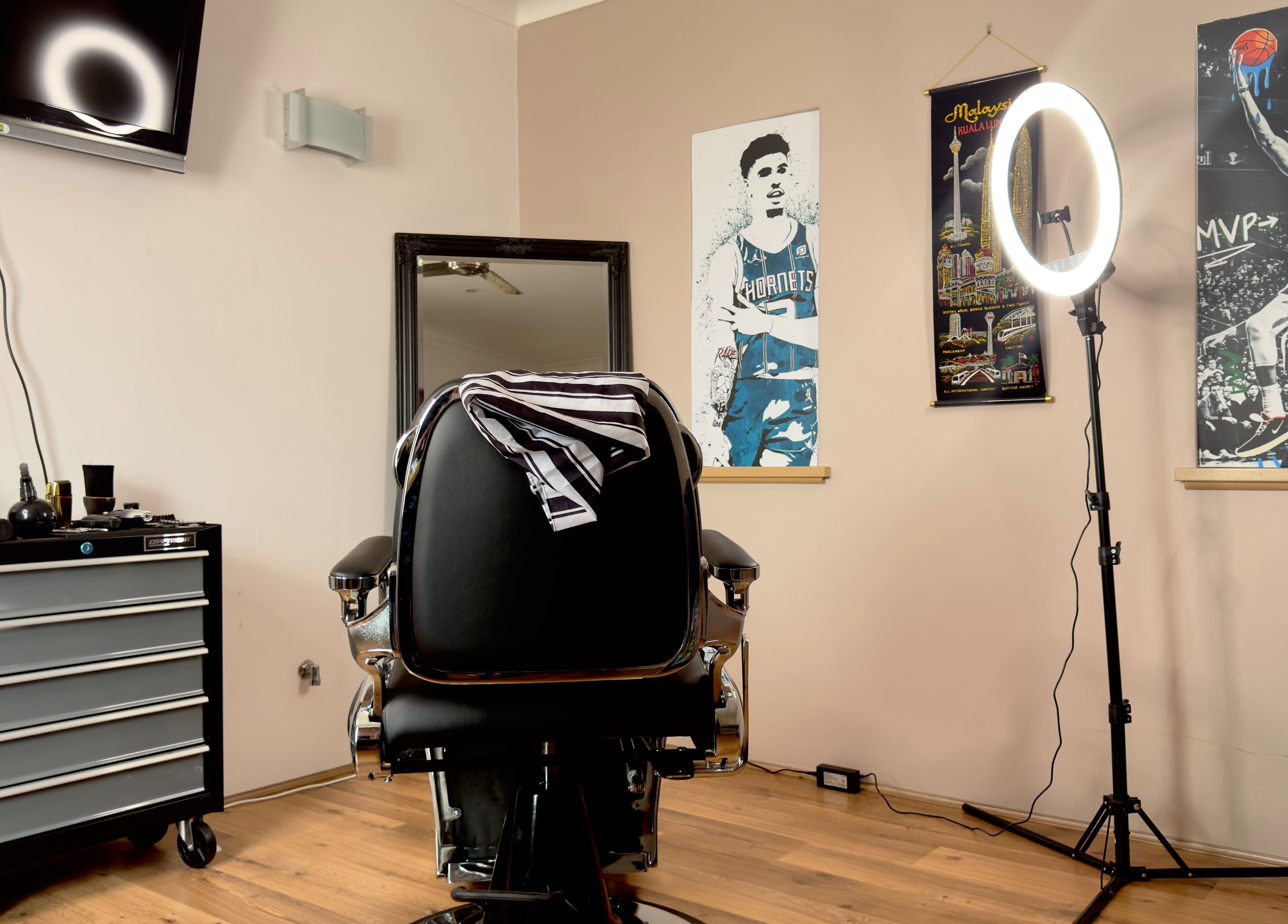 Modern barber chair at Scully’s Barbershop in Clarkson, Western Australia, AU with stylish decor.