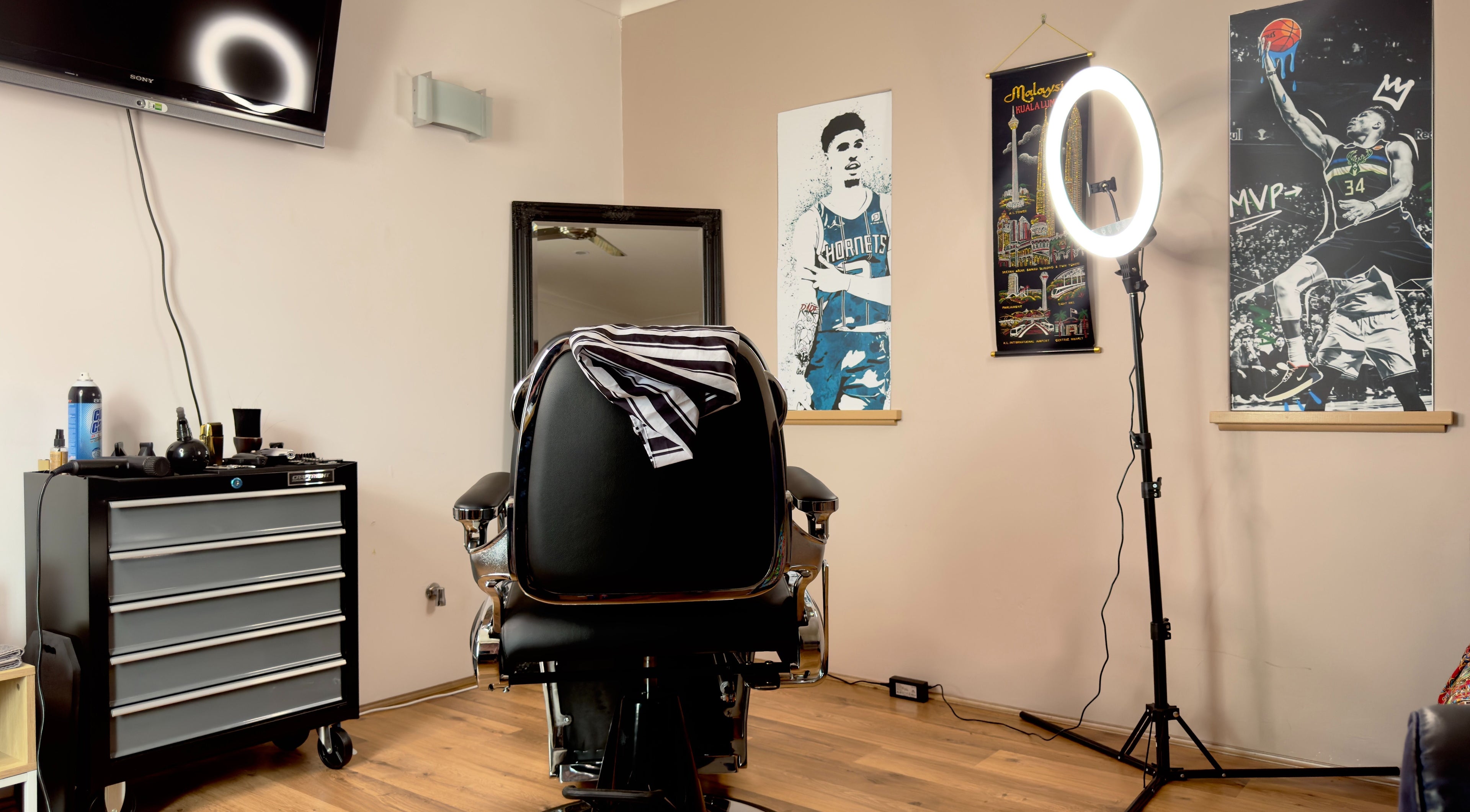 Modern barber chair at Scully’s Barbershop in Clarkson, Western Australia, AU with stylish decor.