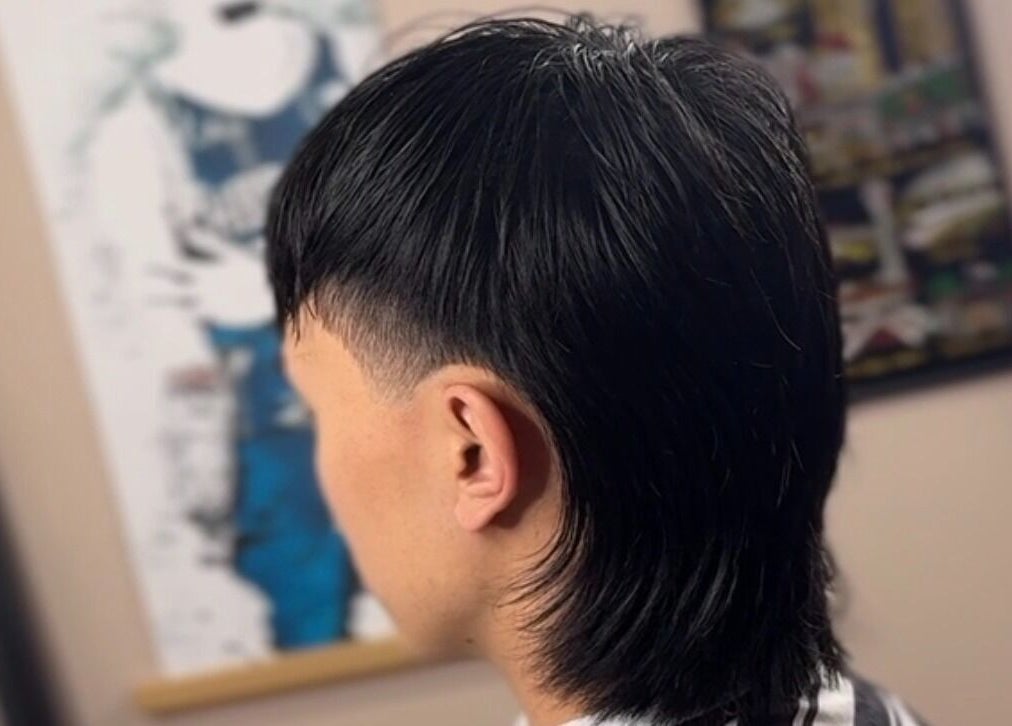 Trendy mullet hairstyle created at Scully’s Barbershop, Clarkson, Western Australia, AU.