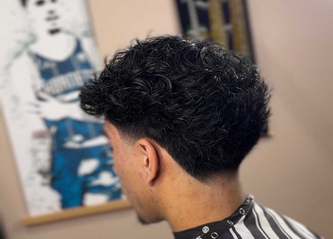 Modern curly hairstyle at Scully’s Barbershop, Clarkson, Western Australia, AU.