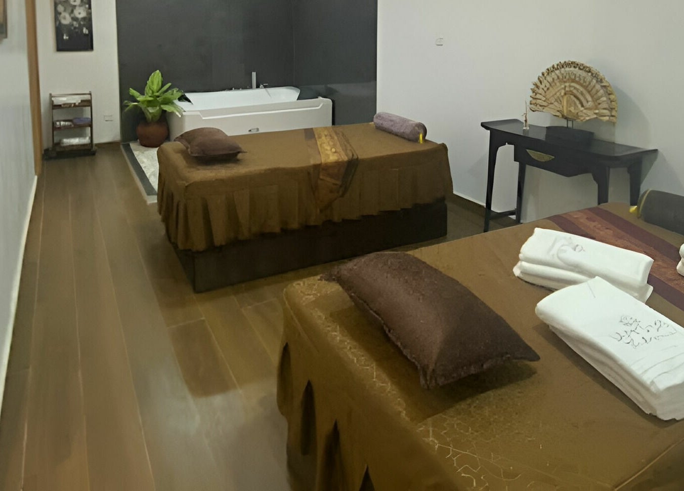 Two massage tables in a serene setting at Safi's Spa, Abuja, Federal Capital Territory, NG.