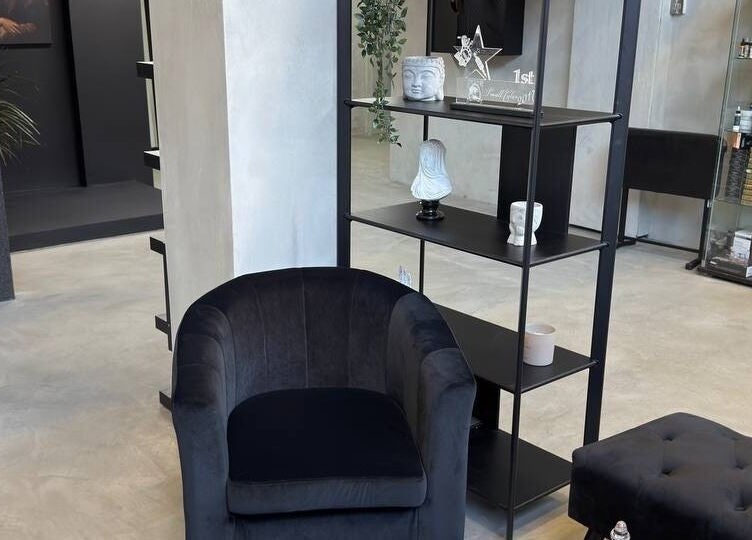 Elegant lounge area at Ink Story Tattoo in Larnaka, Larnaka, CY showcasing stylish decor and seating.