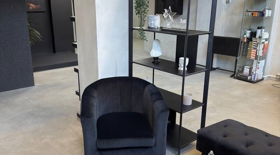 Elegant lounge area at Ink Story Tattoo in Larnaka, Larnaka, CY showcasing stylish decor and seating.