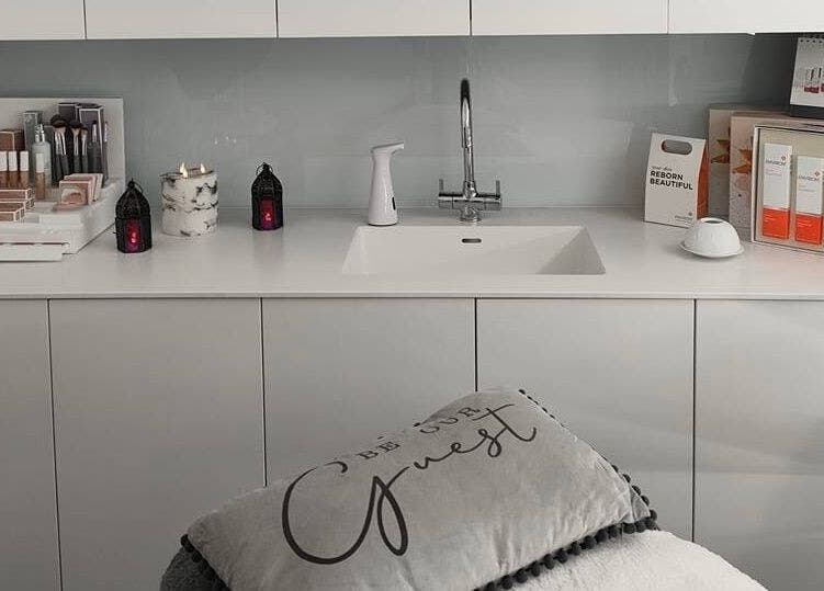 Beauty Within Durham spa setup with skincare products on white counter in Durham, England, GB.