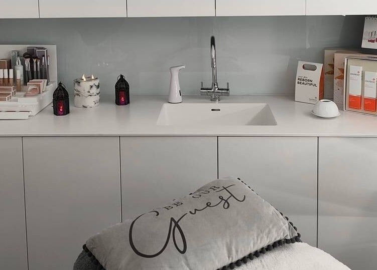 Beauty Within Durham spa setup with skincare products on white counter in Durham, England, GB.