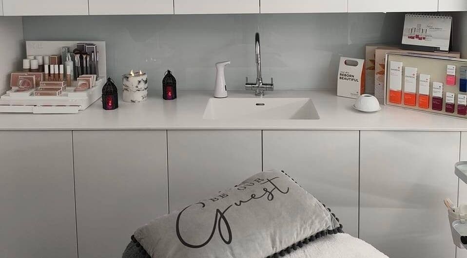 Beauty Within Durham spa setup with skincare products on white counter in Durham, England, GB.