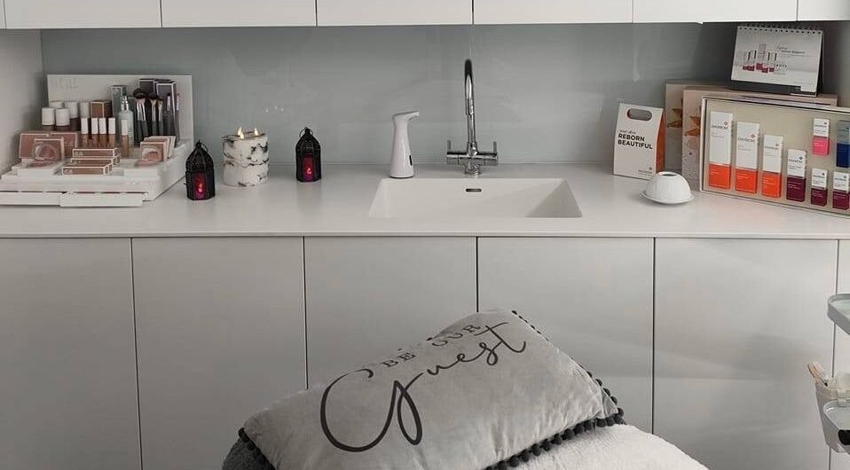 Beauty Within Durham spa setup with skincare products on white counter in Durham, England, GB.