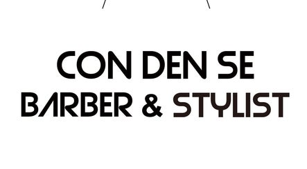 Con Den Se Barber & Stylist sign at Hong Kong 香港, HK showcasing modern logo design.