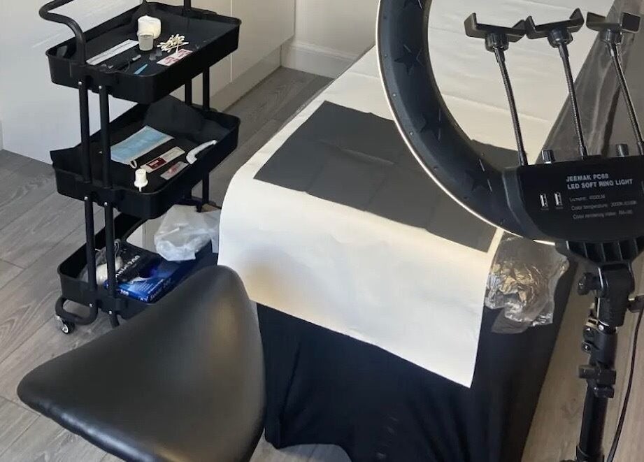 Beauty treatment setup at KB Brows and Beauty in Dunbar, Scotland, GB, featuring a table and ring light.
