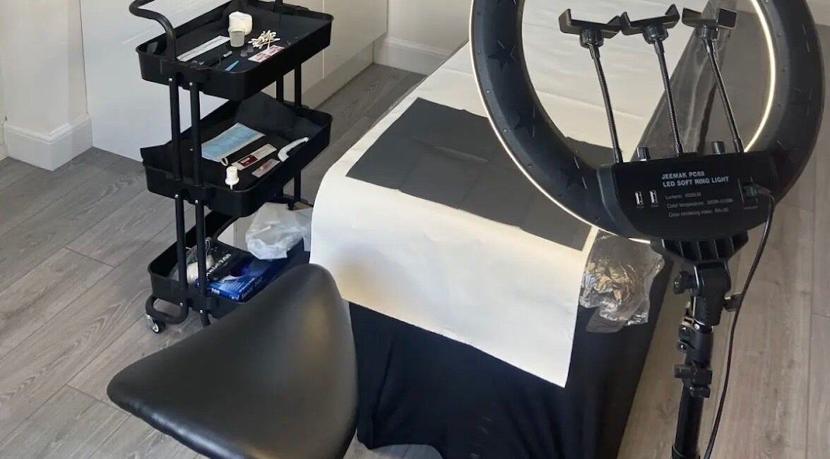 Beauty treatment setup at KB Brows and Beauty in Dunbar, Scotland, GB, featuring a table and ring light.