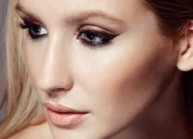 Close-up of a model with glowing makeup at Facebar London, London, England, GB.