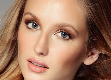 Close-up of a woman with flawless makeup at Facebar London, located in London, England, GB.
