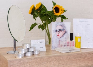 Chic skincare display with sunflowers at Facebar London, London, England, GB.