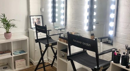 Makeup station at Facebar London with illuminated mirrors and beauty products, located in London, England, GB.