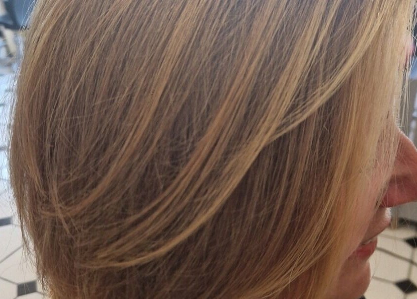 Sleek blonde bob hairstyle at Hair by Catherine, Wimborne Minster, England, GB.