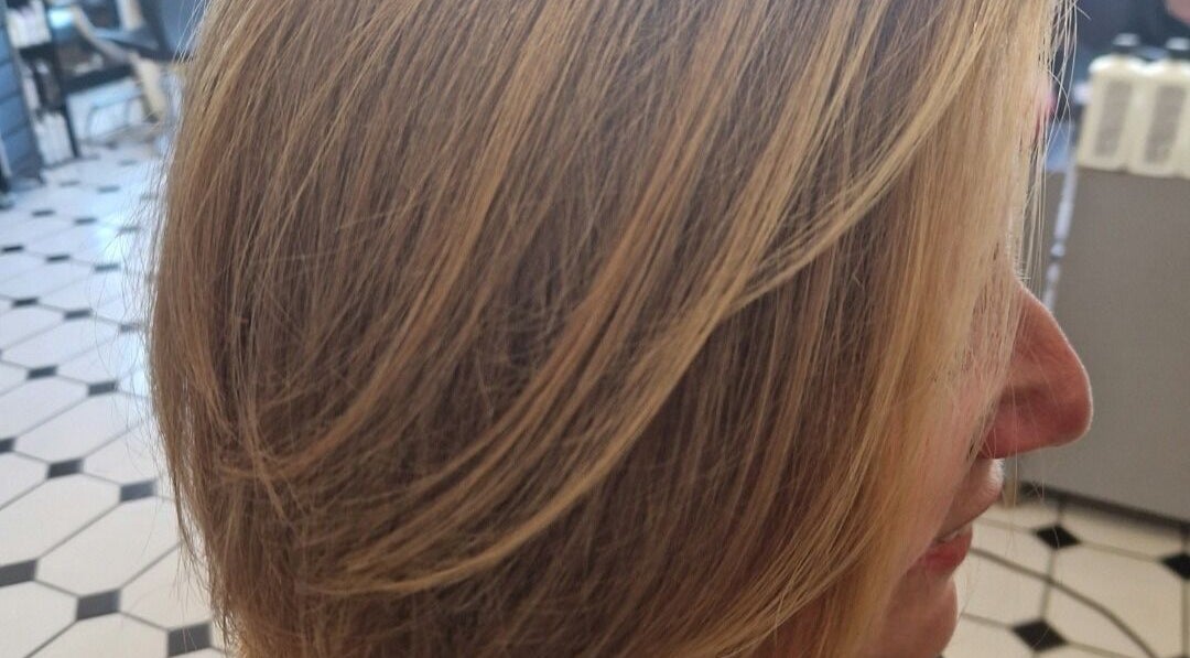 Sleek blonde bob hairstyle at Hair by Catherine, Wimborne Minster, England, GB.