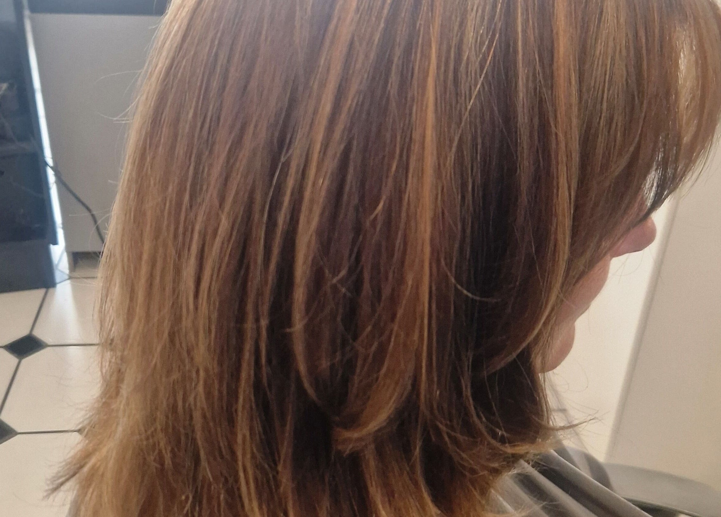 Chic brown hairstyle at Hair by Catherine, Wimborne Minster, England, GB.